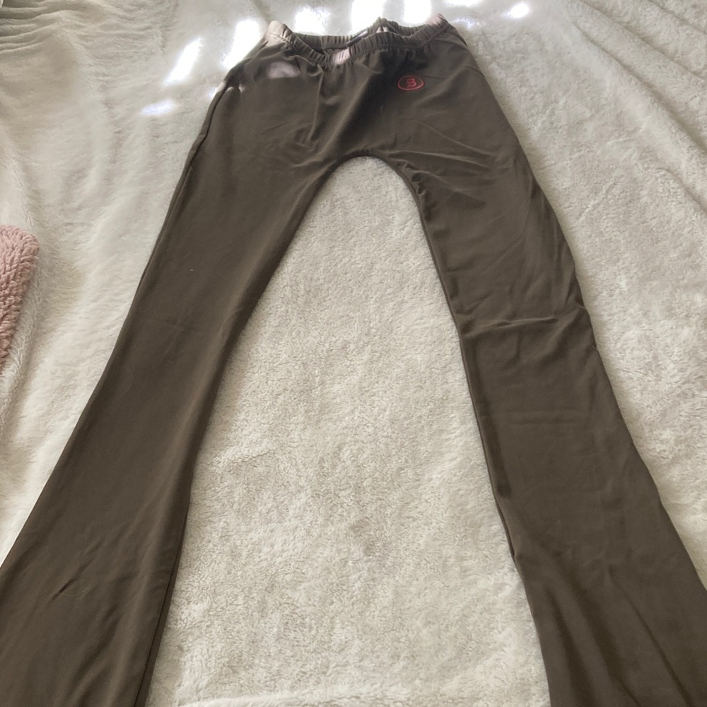 Brown n red lettering body by raven hooded shirt and Flared Pant set